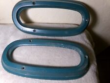 Pair of taillight bezels, L and R, fit 1950 Studebaker Champion, Commander picture