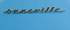 1960'S PONTIAC BONNEVILLE SCRIPT EMBLEM BADGE METAL FACTORY OR PART **BROKEN** picture