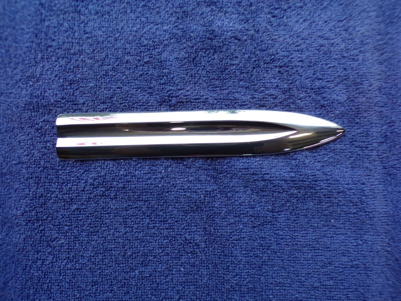 1963-1965 PLYMOUTH VALIANT SIGNET: FENDER TRIM PIECE, RIGHT OR LEFT.