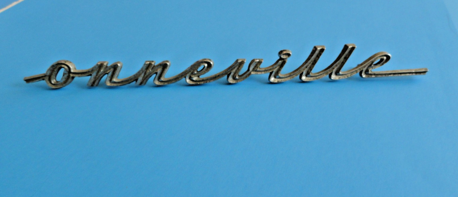 1960\'S PONTIAC BONNEVILLE SCRIPT EMBLEM BADGE METAL FACTORY OR PART **BROKEN**